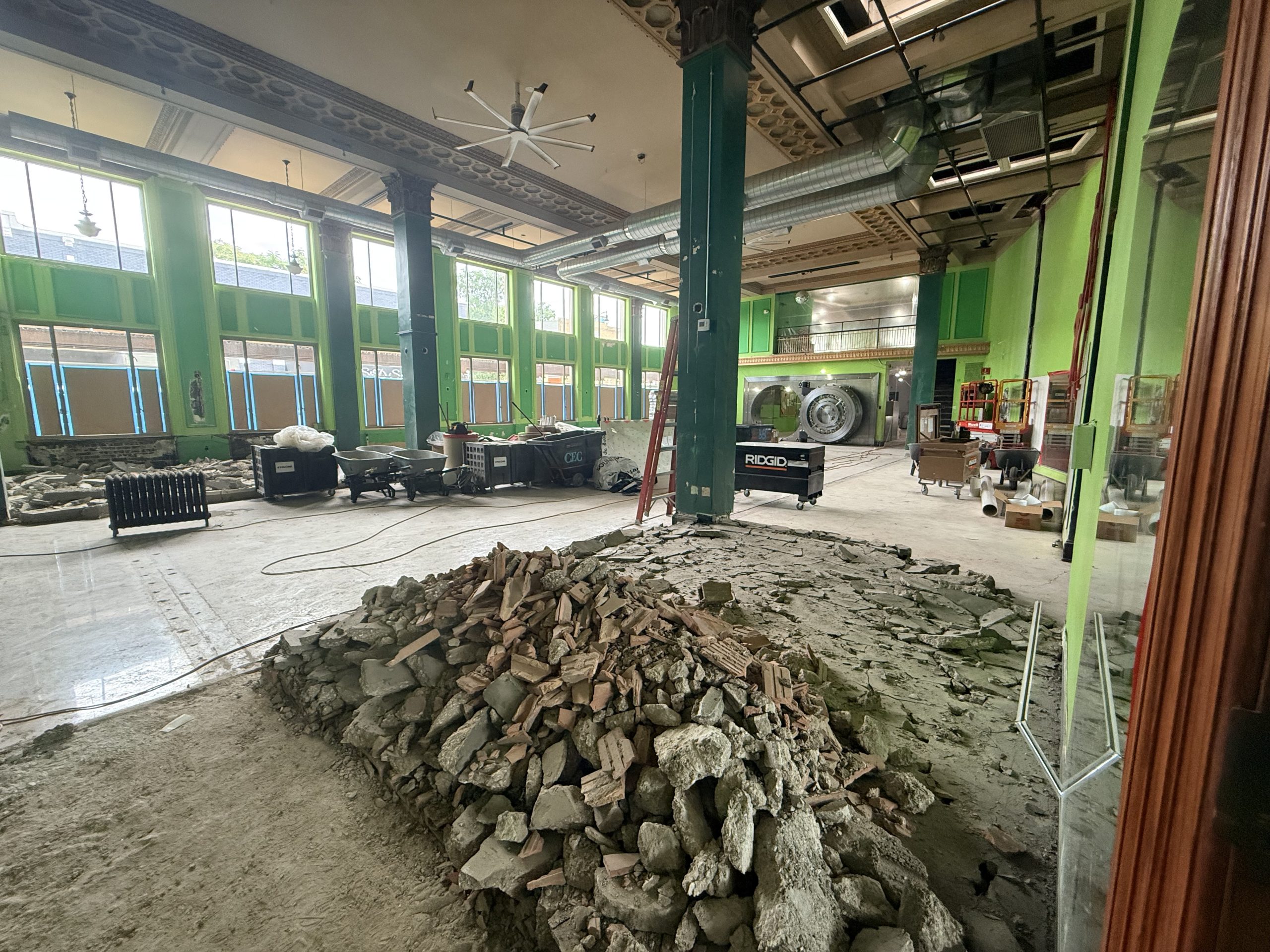 Interior renovation of the Maywood Fine Arts building, showing original architectural details and the historic bank vault